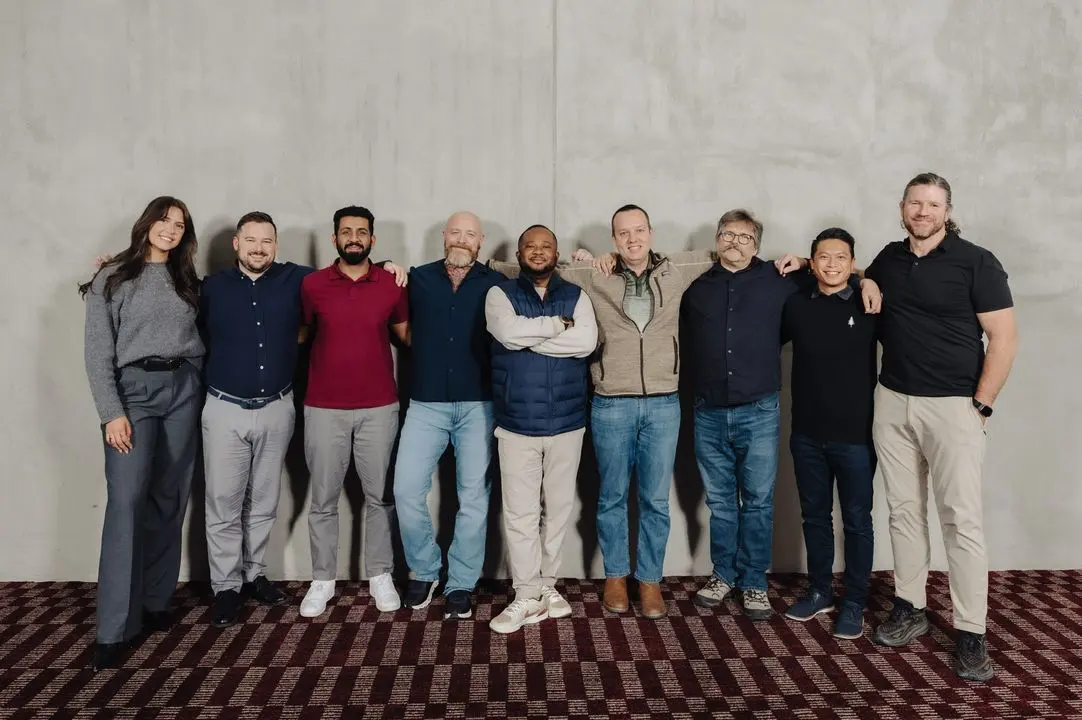 Johnson with teammates, arm in arm, for a team photo
