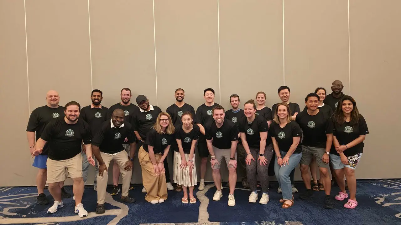 The team in matching shirts at a company offsite